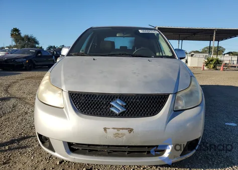 2011 Suzuki Sx4 Le z USA, uszkodzony, nr VIN JS2YC5A24B6301884